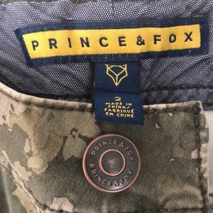 Prince and Fox green shorts